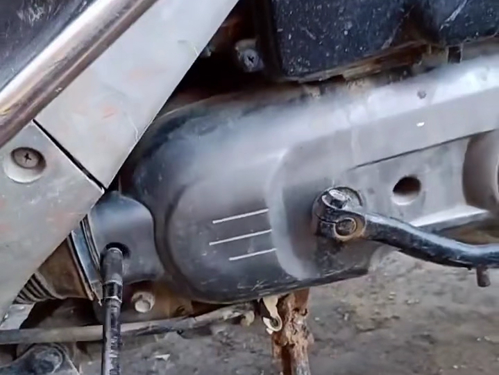 踏板摩托车脚启动杆不回位维修过程