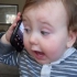 宝宝正玩手机，爸爸突然一把夺走，接下来小家伙的反应家人笑翻了