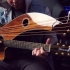 This is a Harp Guitar and It Sounds INCREDIBLE