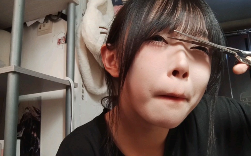 I've wasted a minute of your life watching me cut my bangs.