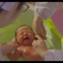 【4K】襁褓中新生儿洗澡按摩婴儿微笑特写妇幼医院宣传片视频素材
