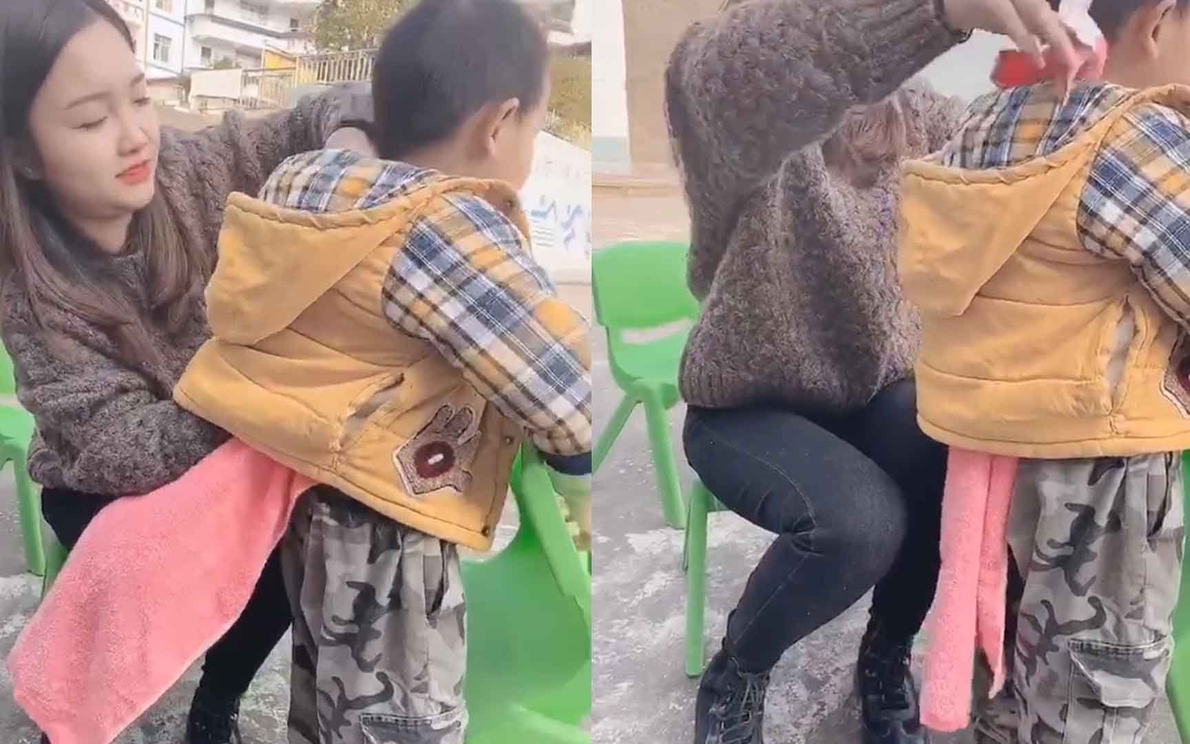 幼儿园孩子外出活动 老师为防感冒着凉用毛巾自创“隔汗巾”