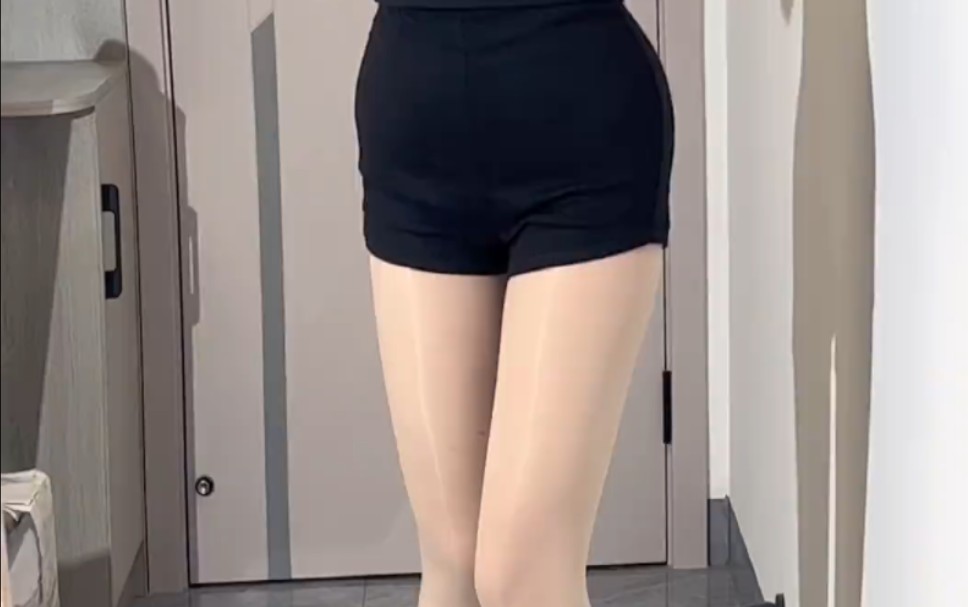 The wrap-around skirt with the shiny flesh is amazing.