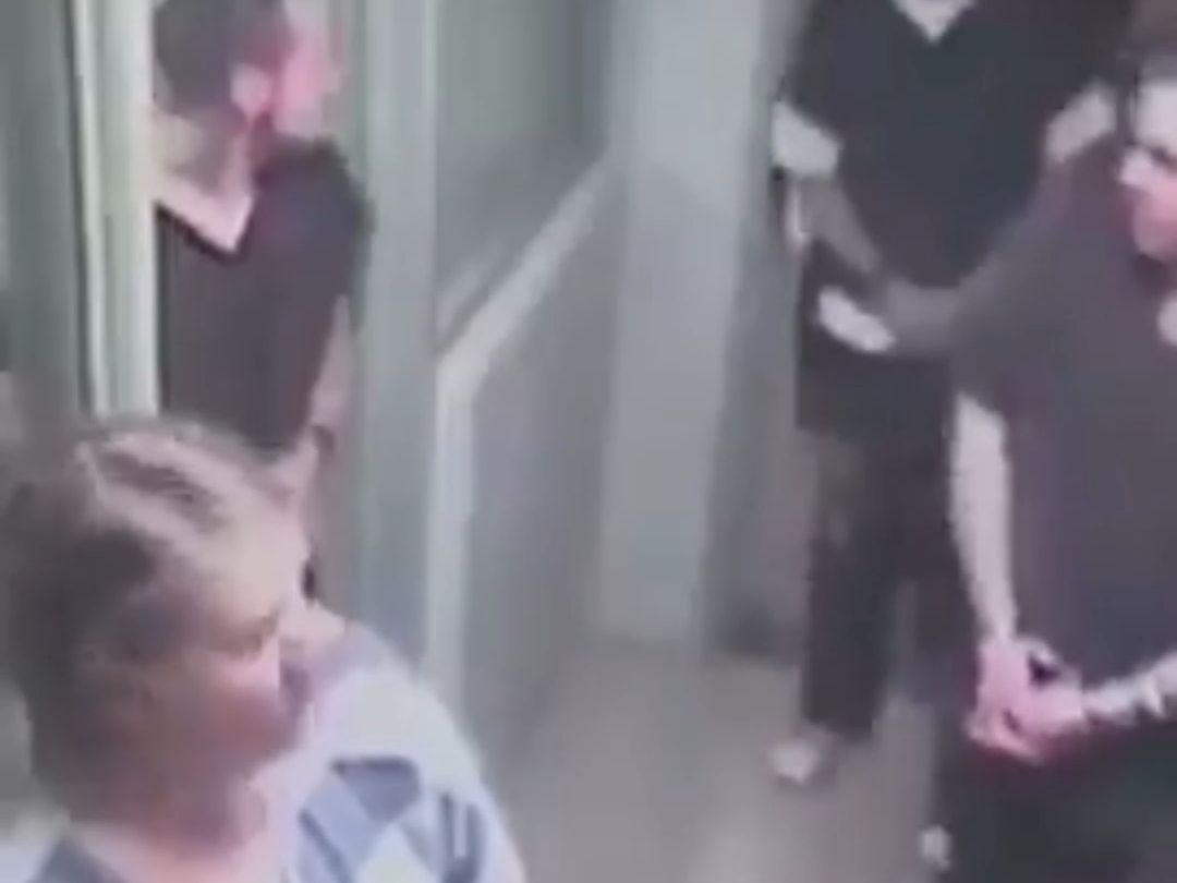 This dude, he's blatantly running through the police station.