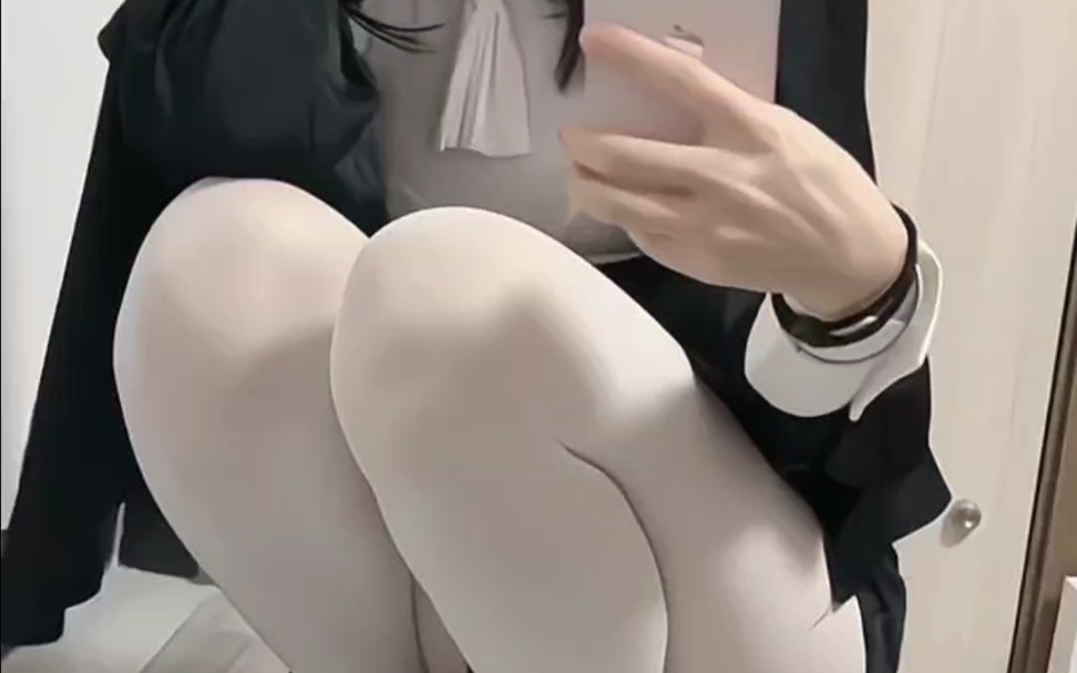 Sisters with white cotton pants