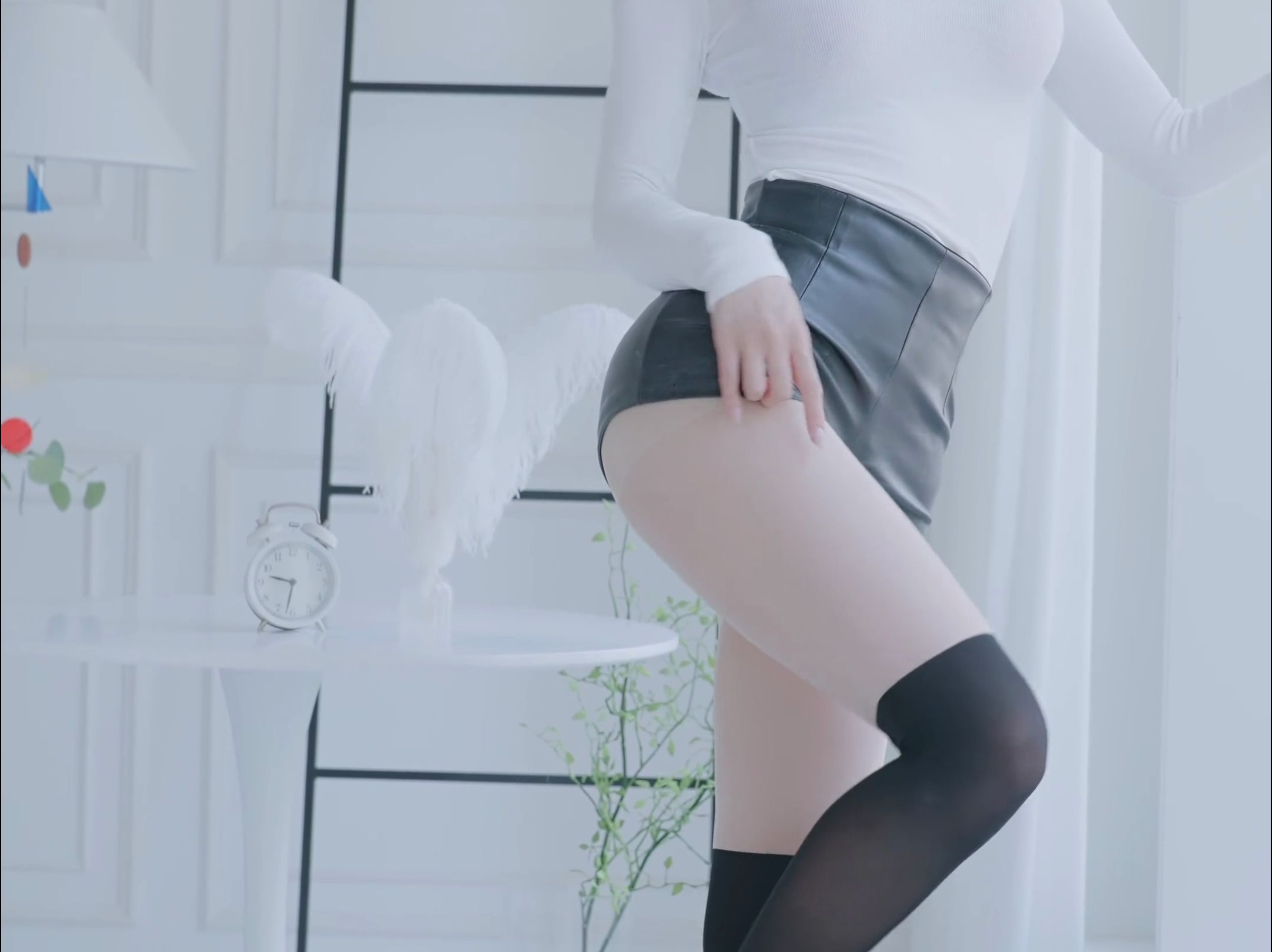 Miss KYUL's leather pants and suspenders outfit