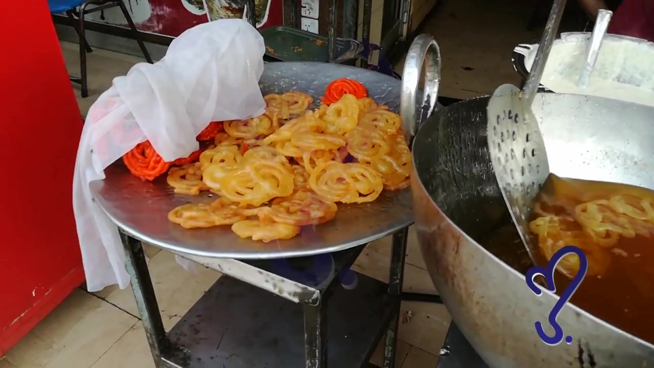 【巴基斯坦街头美食】油炸圈圈裹糖浆
