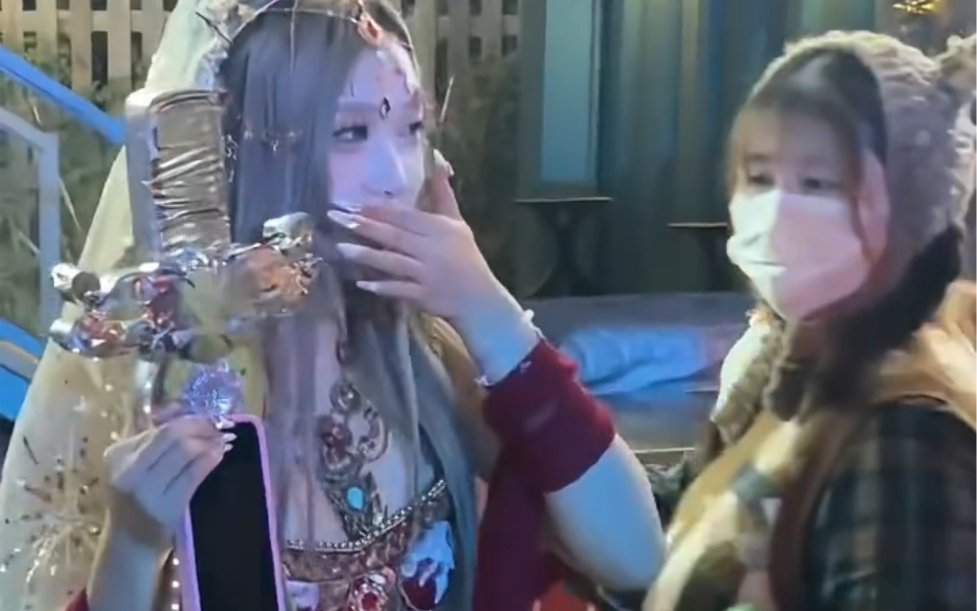 The young lady was surprised by the fireworks!