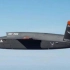 美国首款隐身无人战机亮相 “女武神”将伴随F-35出战