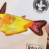 一个水族馆的装置，可以把画作进行扫描，变成会动的鱼展示在屏幕中