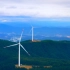 高清航拍山顶的风力发电设备实拍素材