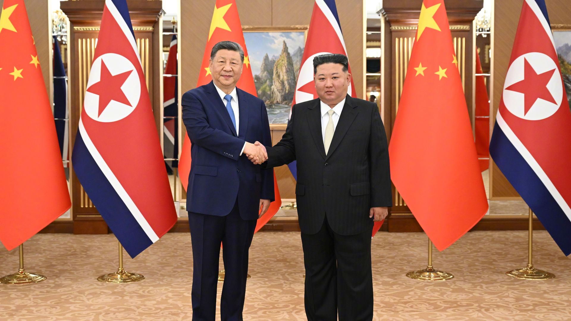 习近平同金正恩举行会谈
