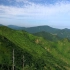 4K航拍美丽的春天绿色大山风景高清视频素材