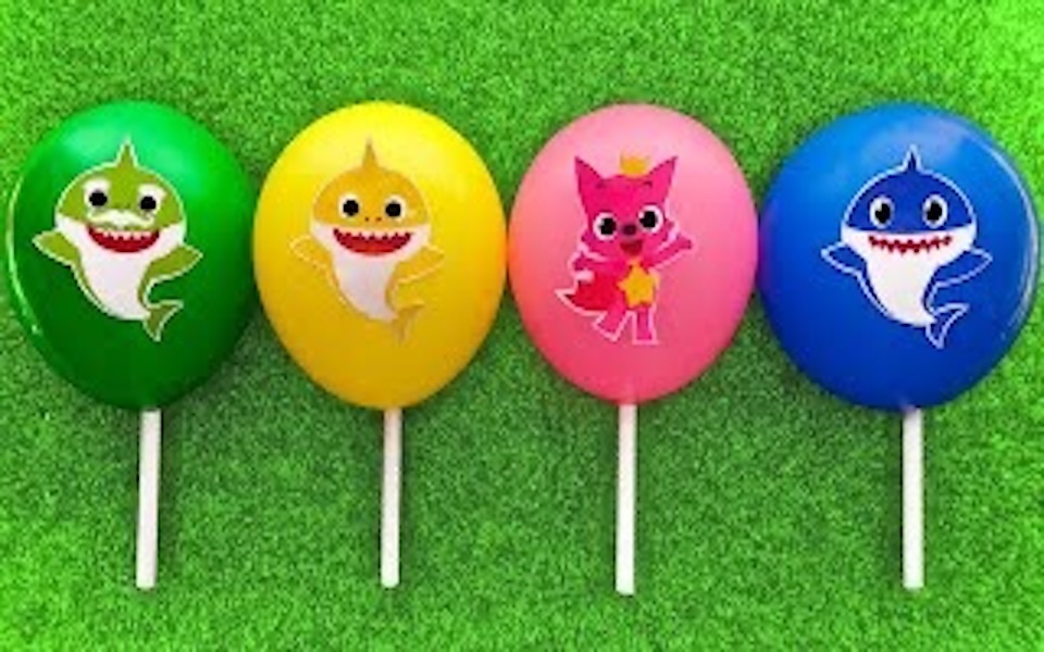 彩色棒棒糖气球里藏着一些小鲨鱼恐龙 儿童DIY玩具