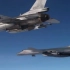 波兰空军f-16战斗机和美空军b-1b轰炸机联合演习