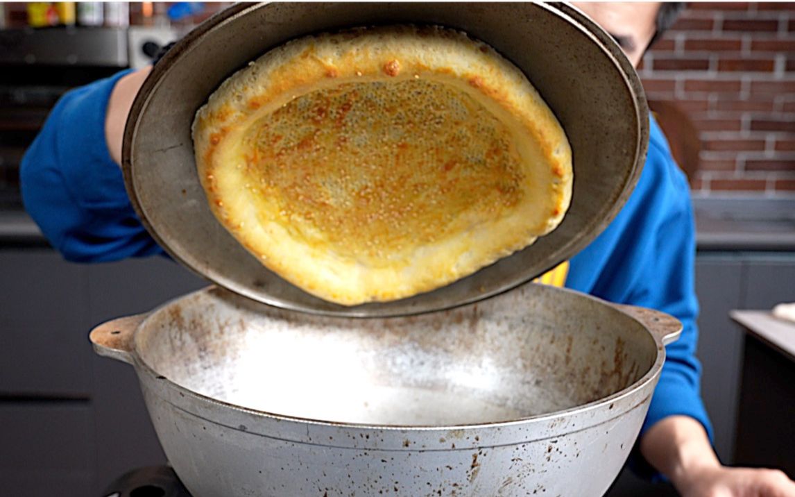 如何用锅盖做新疆烤馕