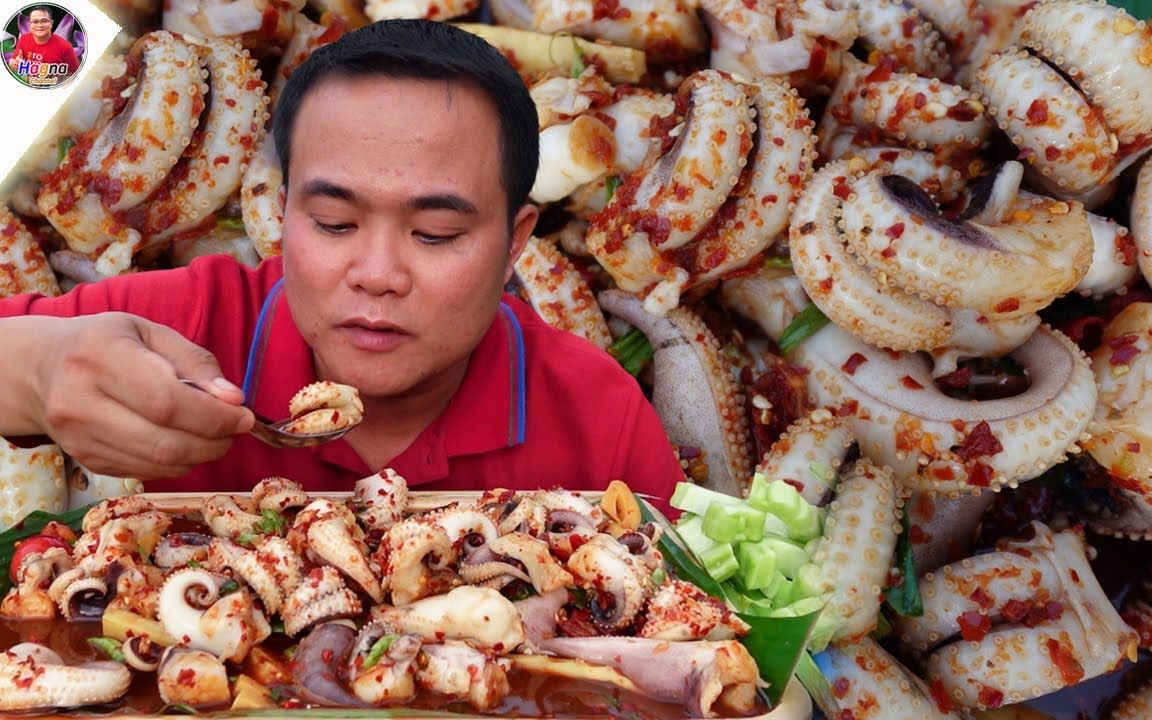 泰国大叔吃松脆的鱿鱼触角，配秘制蘸酱，新鲜时蔬。看这就想来一盘