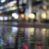 雨中低视角拍摄街上行人视频34989
