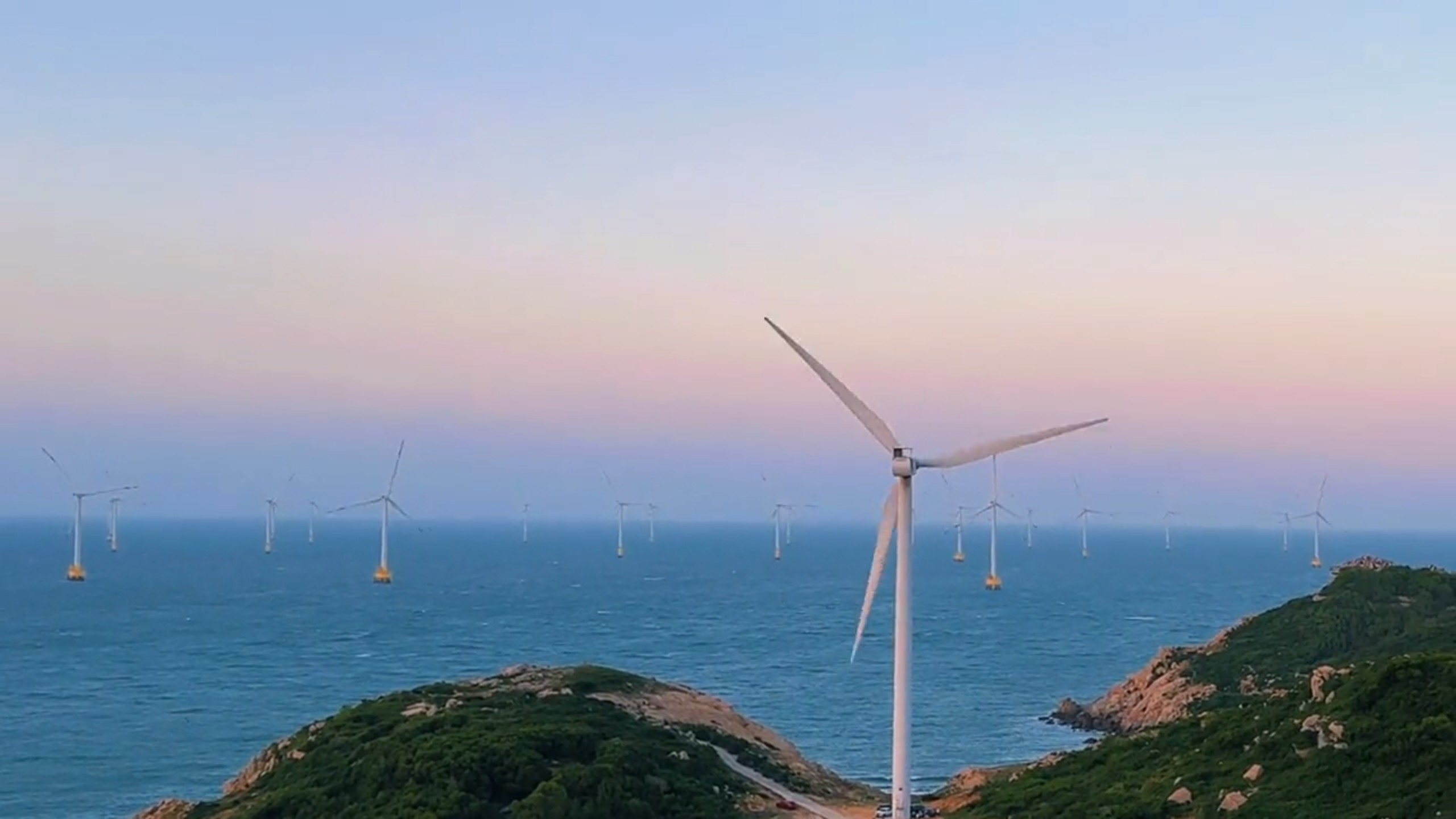 风车不言 落日不语 山海之间 皆是诗意