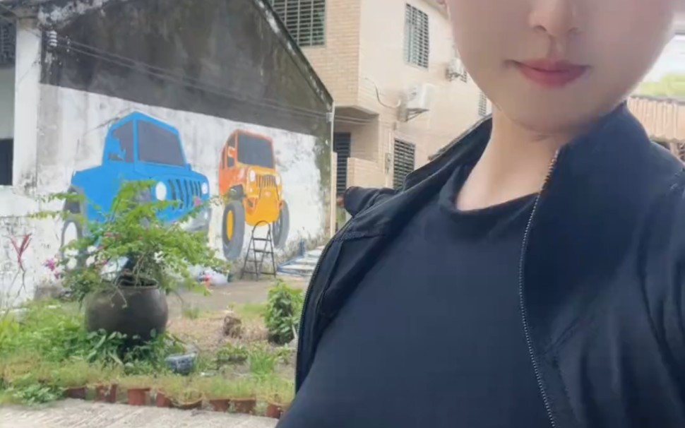 It was windy and the coconuts in the trees almost missed me.