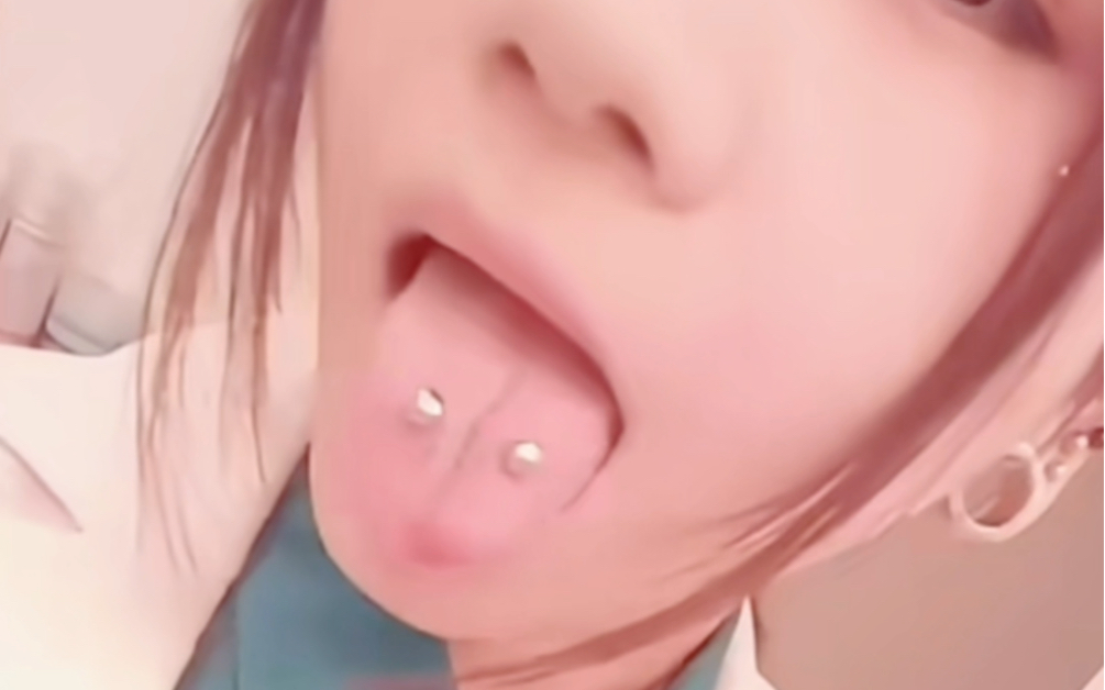 Two tongue piercing