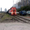 沌口支线之DF7C-5404牵引敞车通过洲头路道口