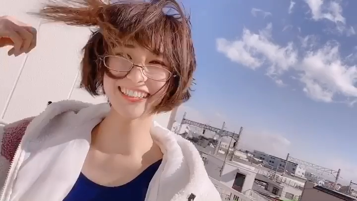 Competitive swimming model rooftop selfie