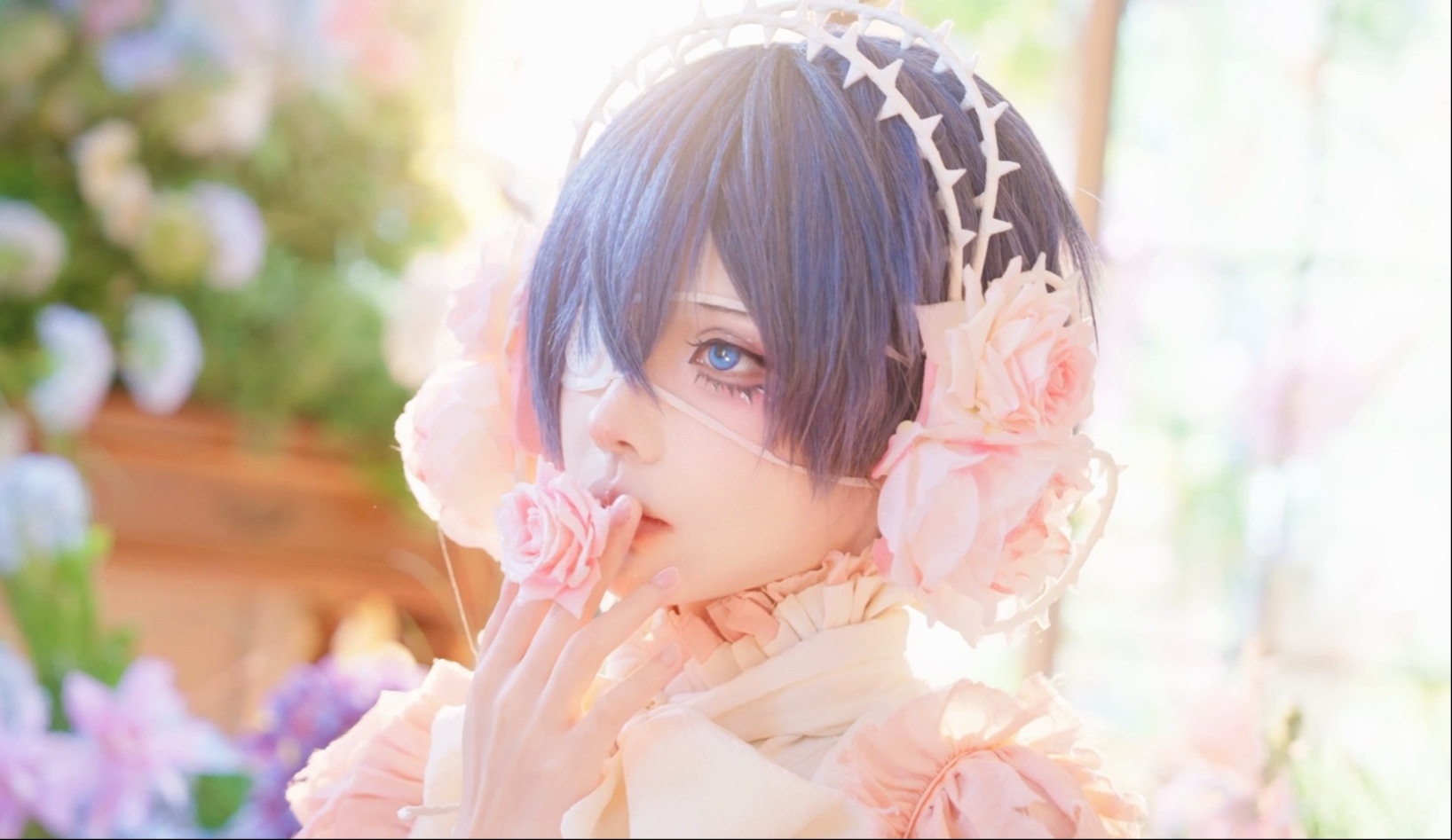 A young man wrapped in thorns.