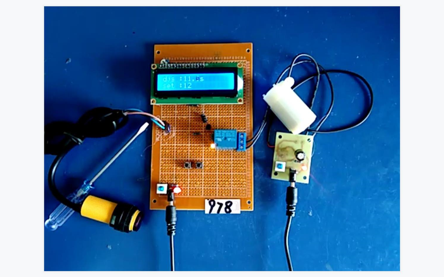 基於51單片機的紅外感應水龍頭控制系統設計-e18-relay-lcd1602-key