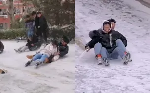 Download Video: 青岛下雪了 高校里的大斜坡秒变冰滑梯 学生纷纷“打卡”场面欢乐