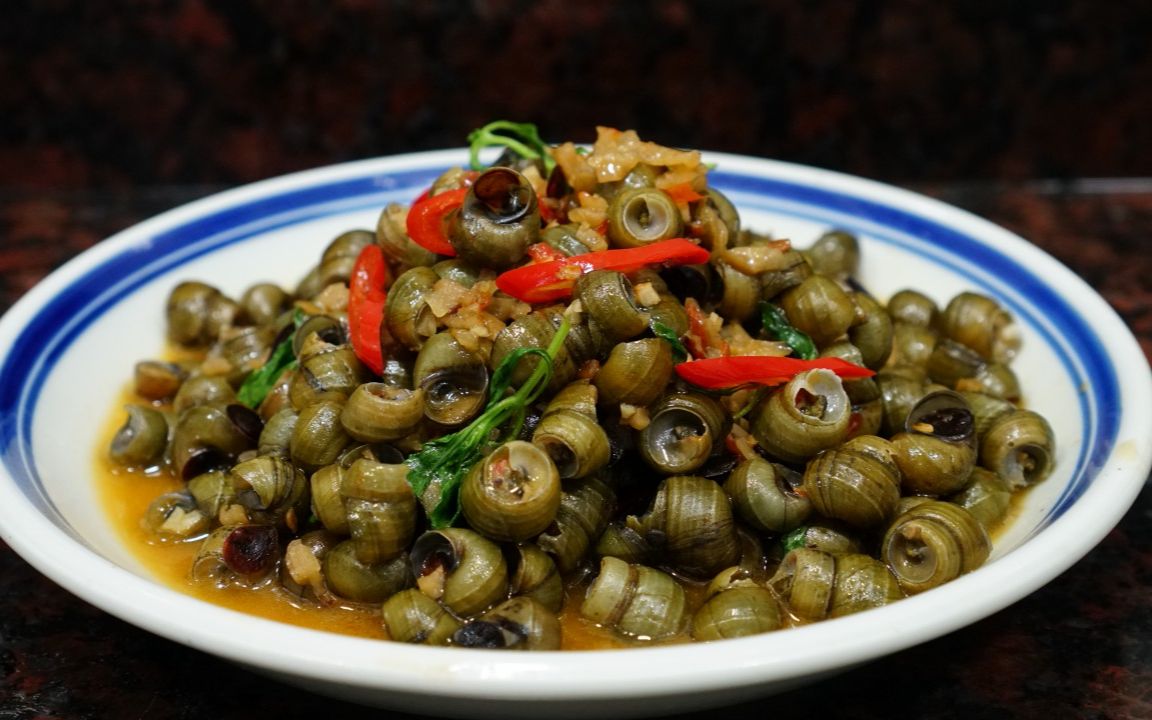 萝卜干炒田螺,潮汕人夏季爱吃的下酒菜,美味