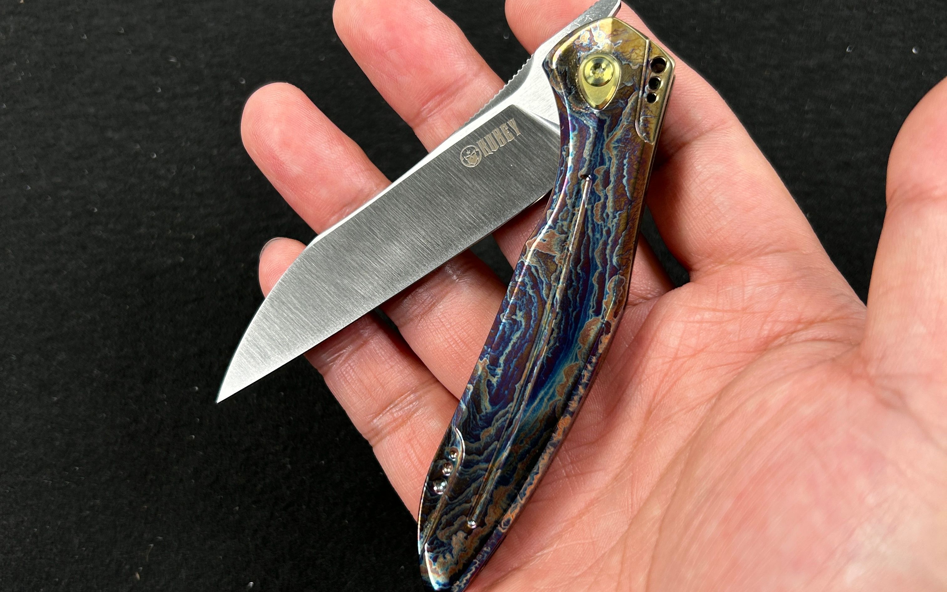 kubey酷备kb299 m390钢钛合金烧钛工艺柄前置快开折刀