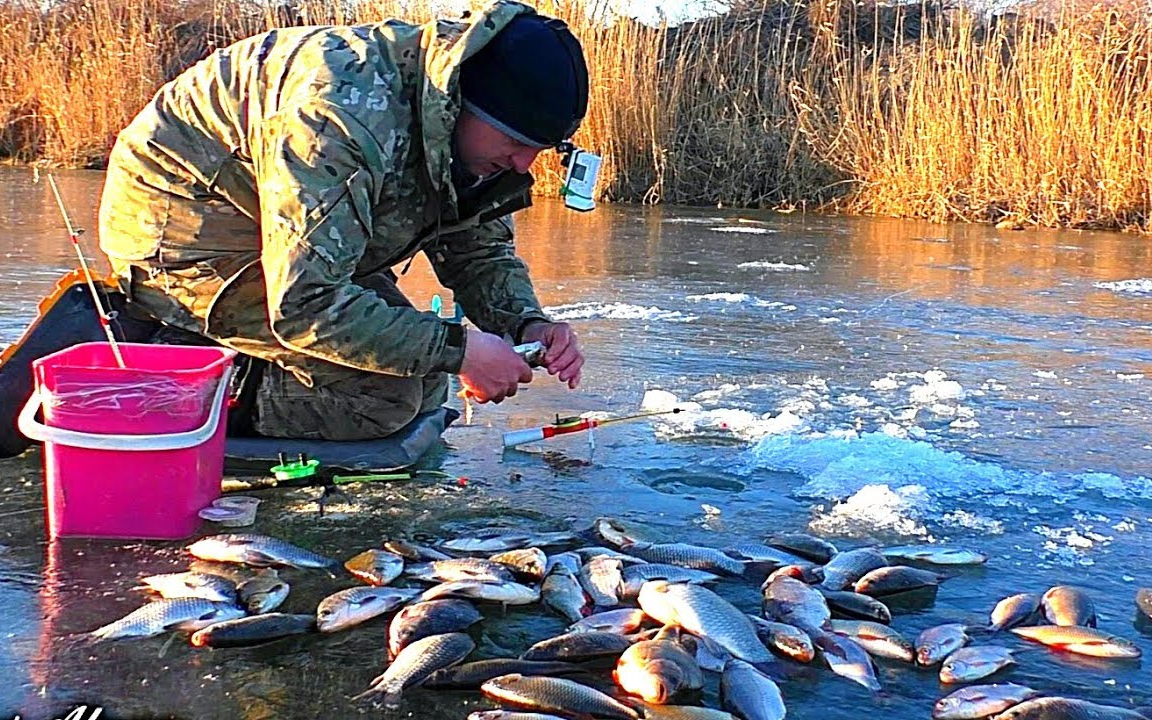 (up自譯中文字幕)俄羅斯小夥冰上釣魚冬天魚口還那麼好