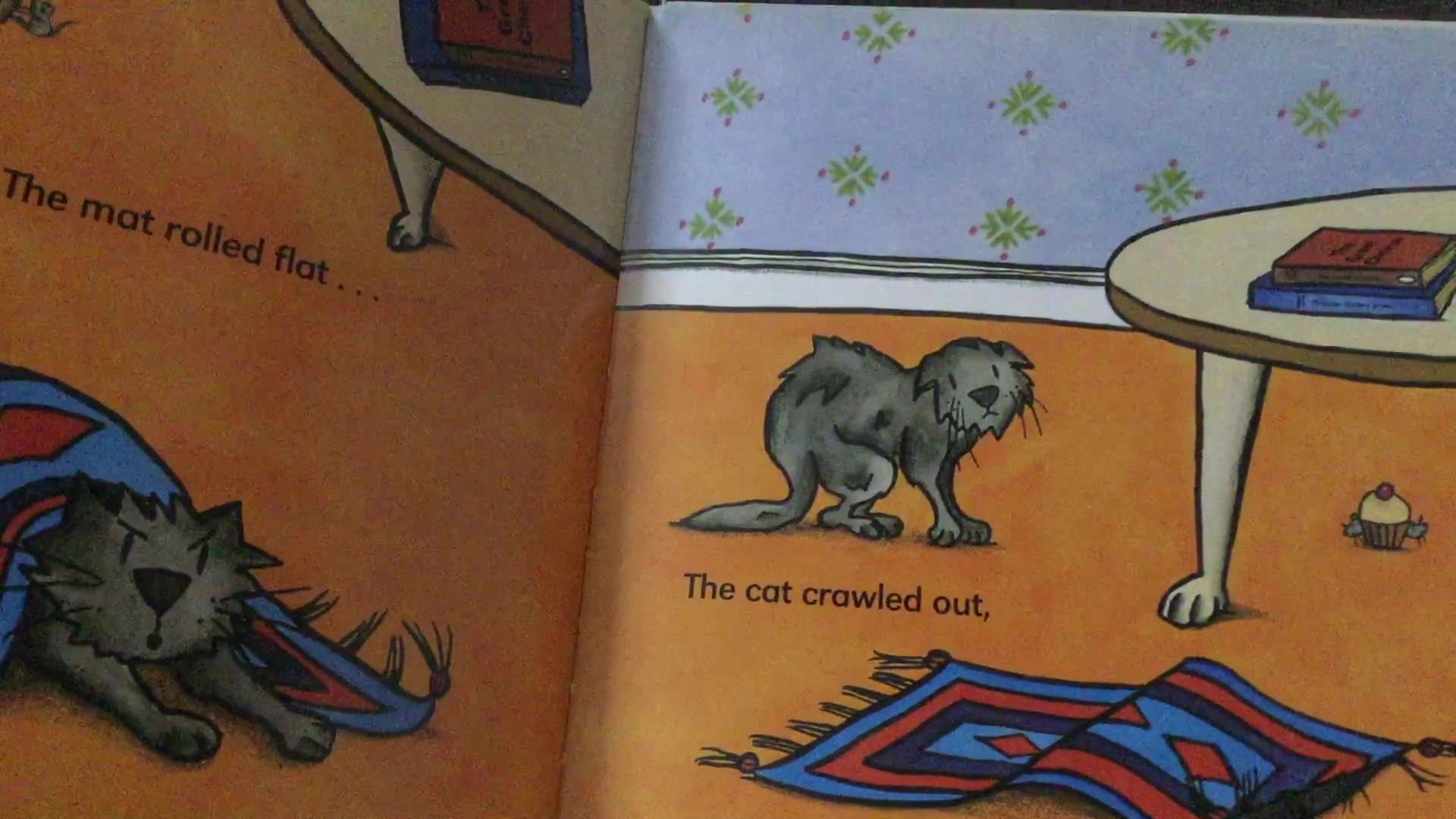 英文绘本: the cat on the mat 2007 fiona manlove (uk)