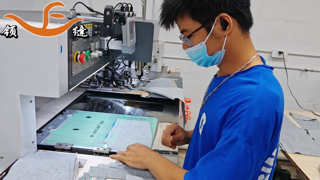 领缝全自动开袋机 激光开袋机 劲霸boss服装口袋挖兜机 羊毛妮子外套