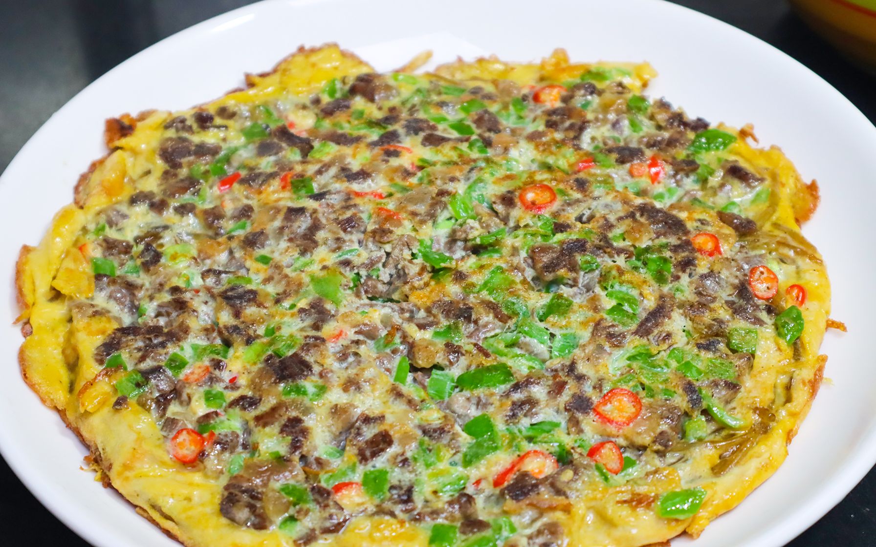 活动  河南特色美食牛肉煎粉条,口感劲道,焦香四溢,比披萨还好吃