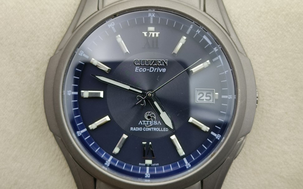 西铁城钛合金海螺光动能电波男表