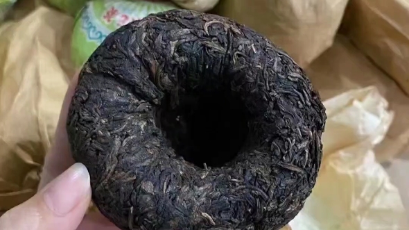 91年重庆沱茶,四川重庆茶厂生产特级重庆沱茶…汤色澄黄明亮,叶底较嫩