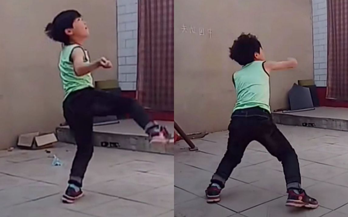男孩热爱武术坚持练习院子里挂水瓶练踢腿:墙上写着"中国功夫"