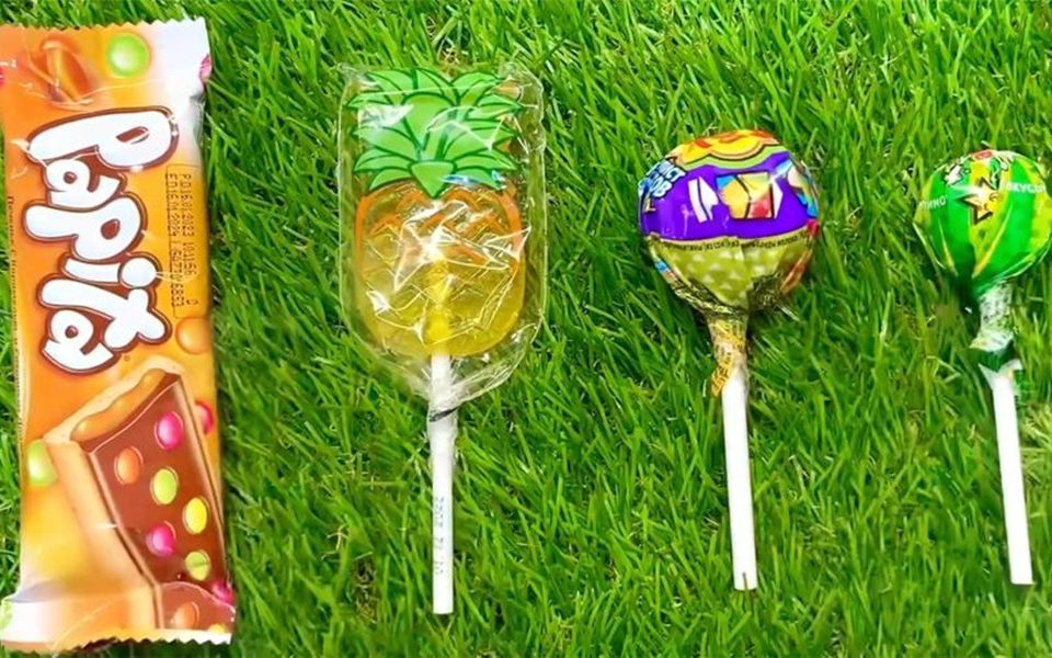 试吃菠萝形状棒棒糖,橙子味棒棒糖,脆脆巧克力棒,嘎香!