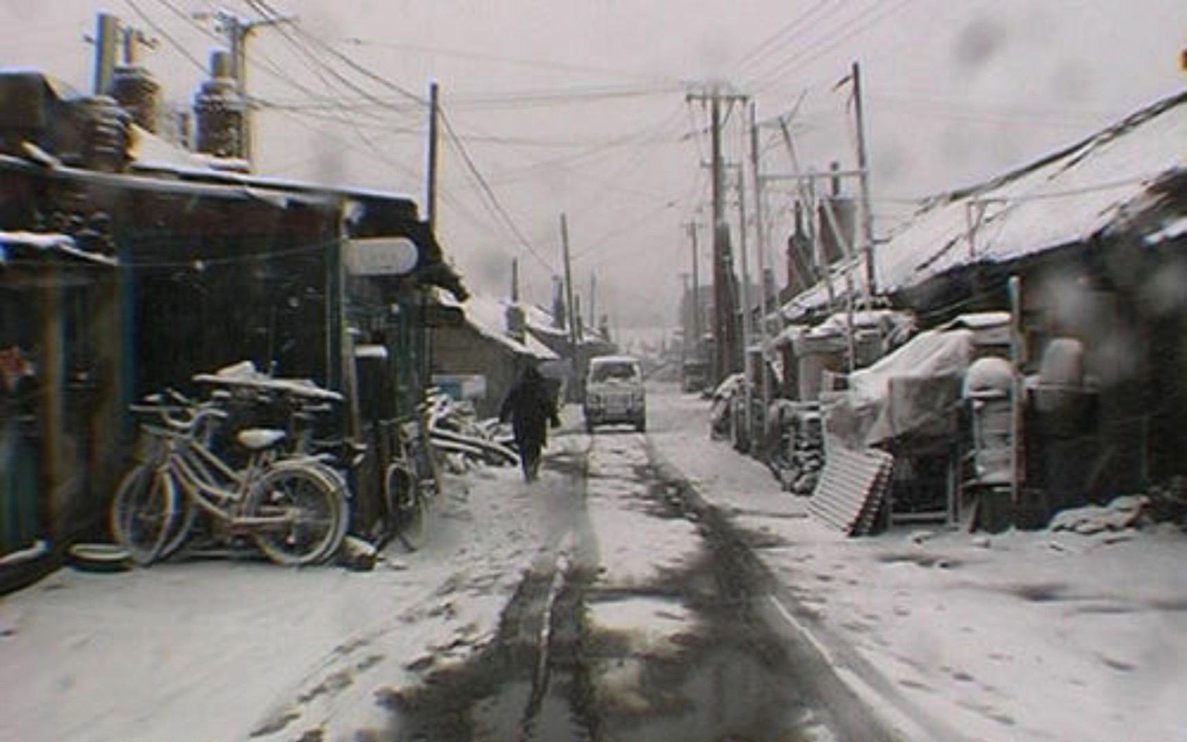 [图]“艳粉街埋藏在雪里，有人遗忘有人铭记。”