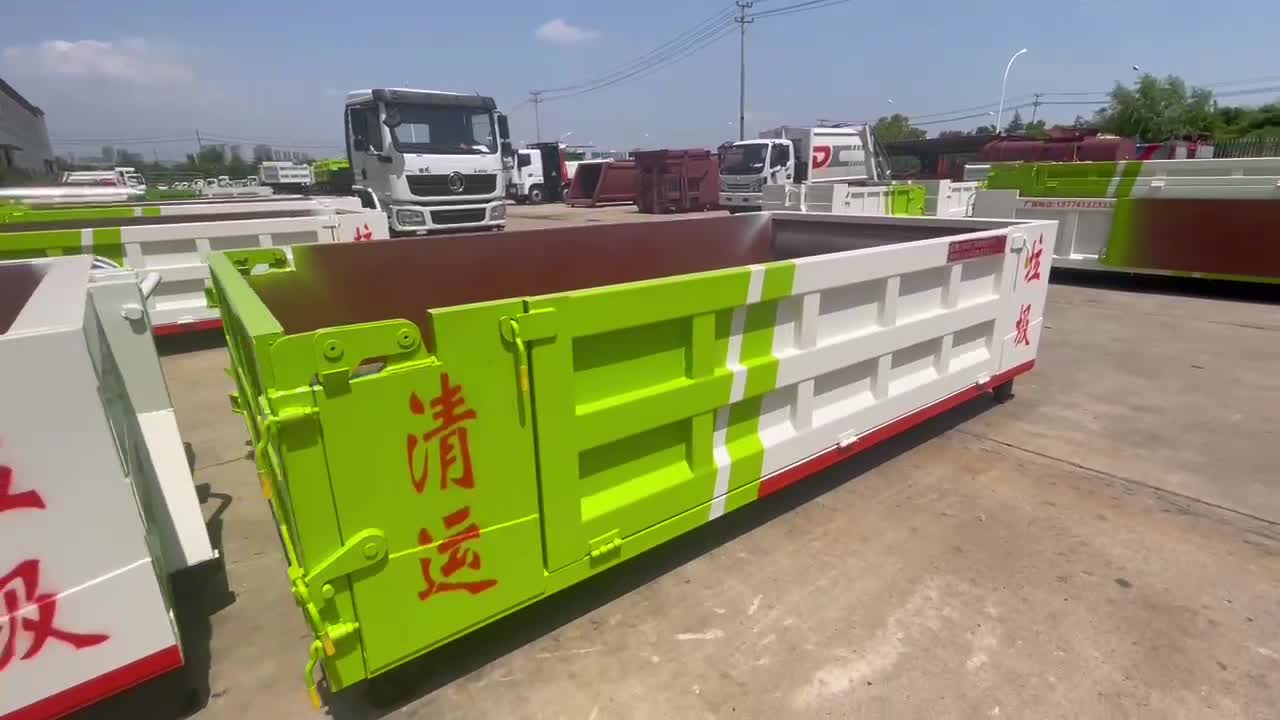 10-12吨国六蓝牌车厢可卸式勾臂落地斗垃圾车匹配6-7方建筑垃圾箱