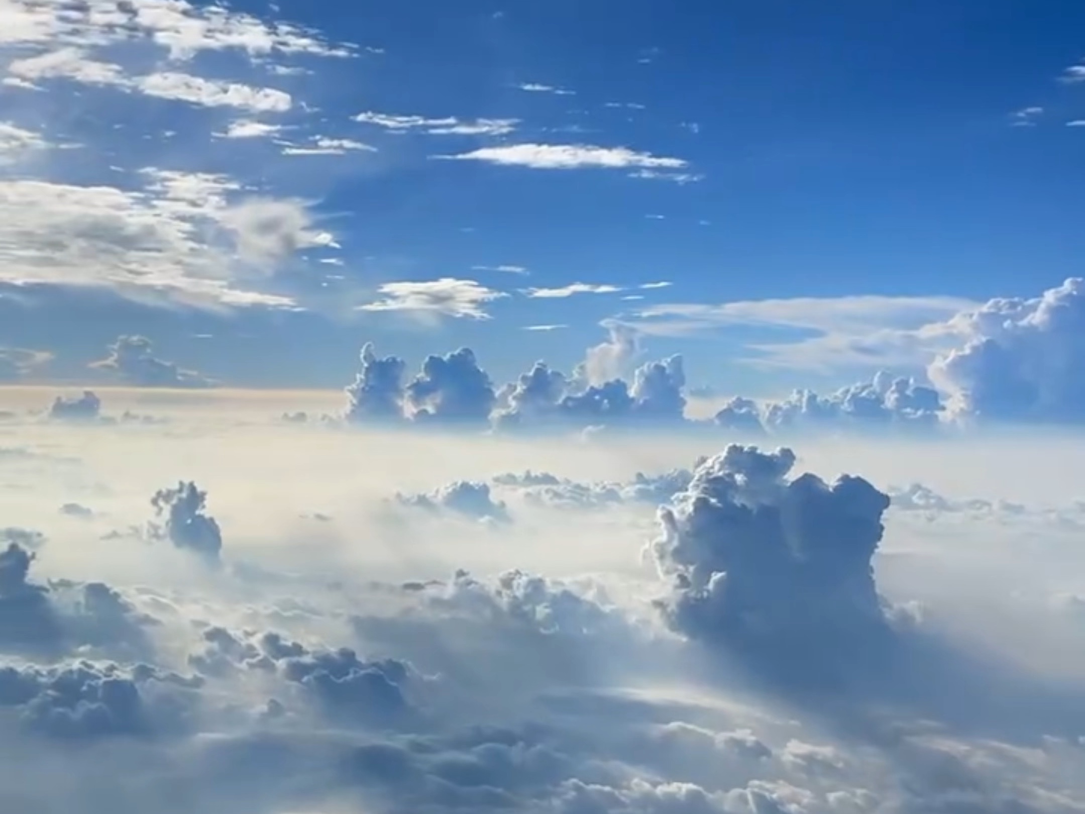 随手拍,飞机窗外的世界令人心驰神往!#云海 #蓝天白云#云层上的风景