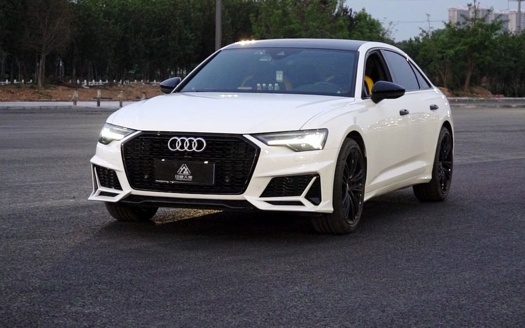 奥迪a6l改装mtm星耀套件,钢琴白改色膜!