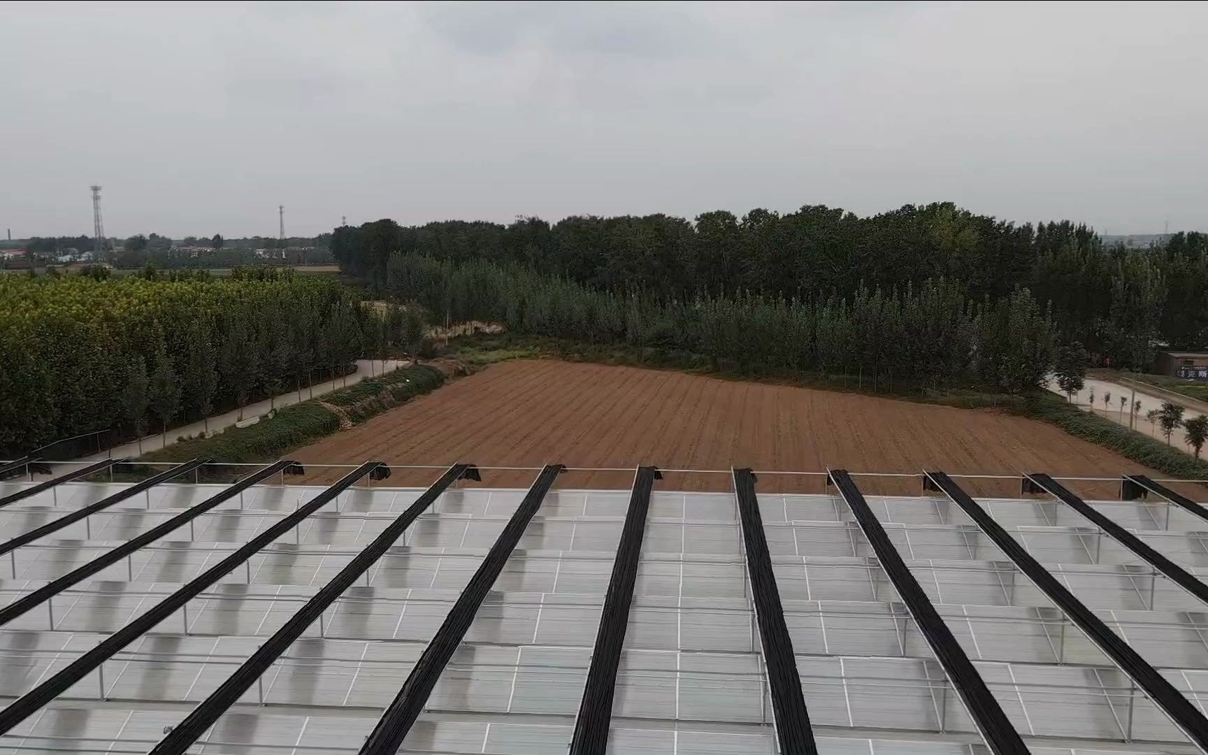 《歌珊温室》航拍完工后的焦作博爱县连栋阳光板(玻璃)温室大棚