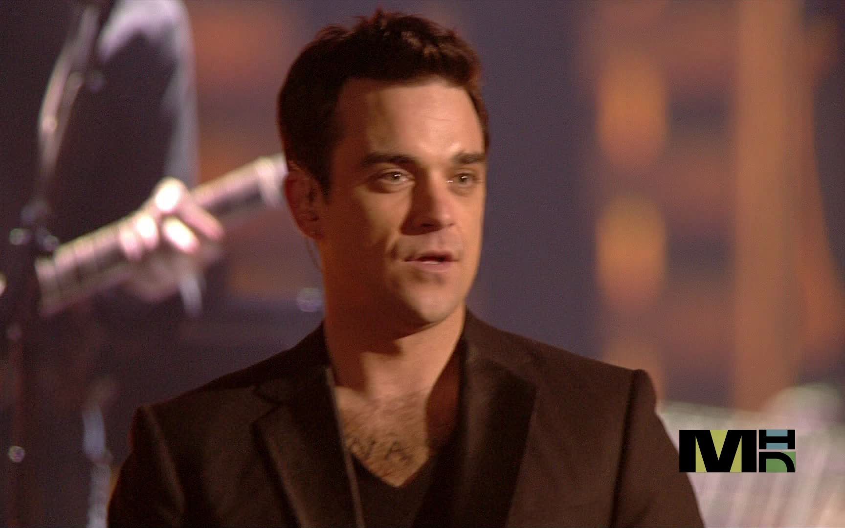 [图]Robbie Williams - Tripping (Live 2005 MTV Europe Music Awards)