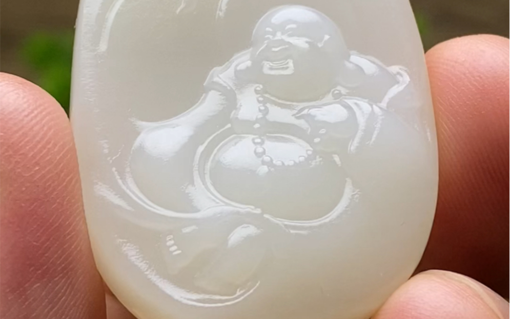 和田羊脂白玉《弥勒佛》牌子尺寸:44.7/31.6/9.9mm重量:25.4mm