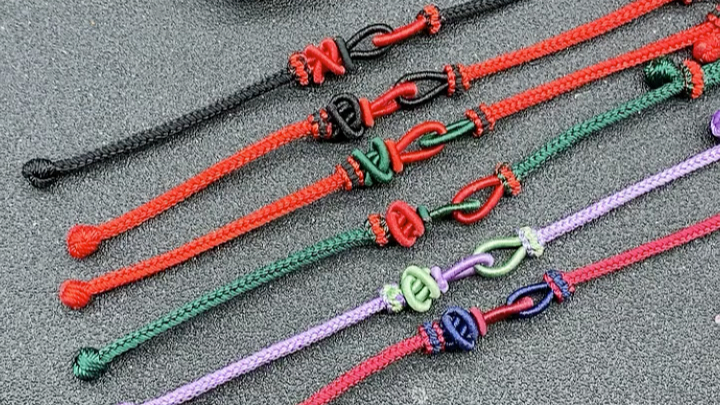 手工编绳手链双联结,又名大乘金刚结手绳