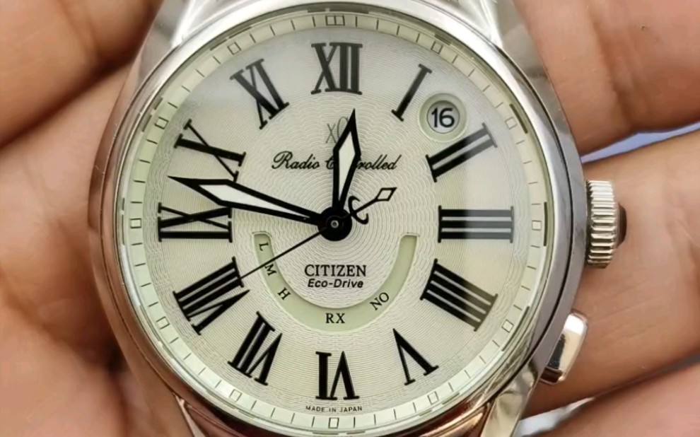 西铁城xc高端光动能电波男表