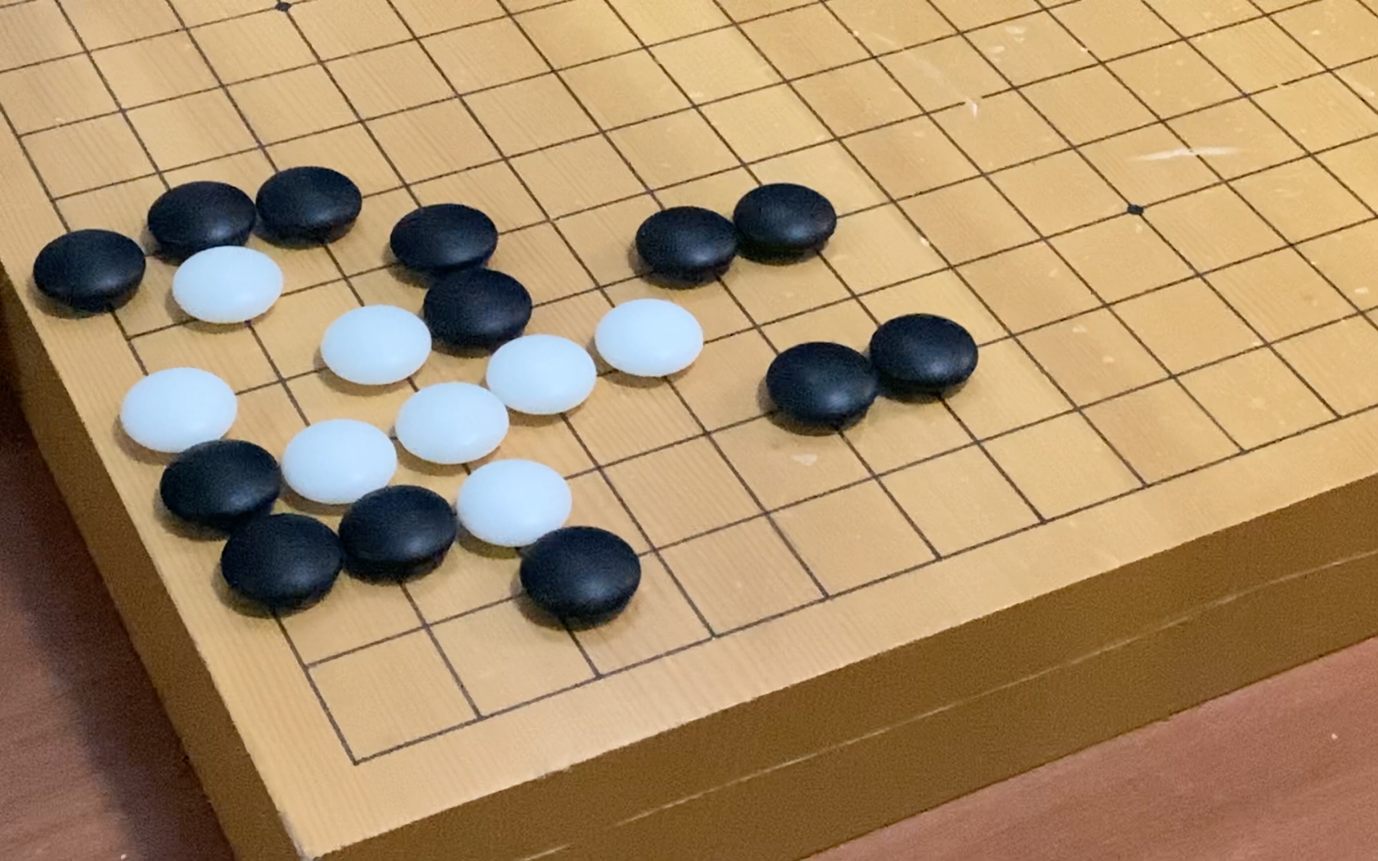 围棋死活题题,难度业余三至四段技巧